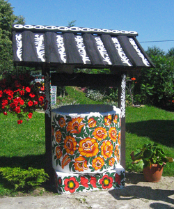 A decorated water well in Zalipie, Poland