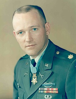 Major Roger Donlon, US Army. Note golden oak leaf insignia on shoulder board.