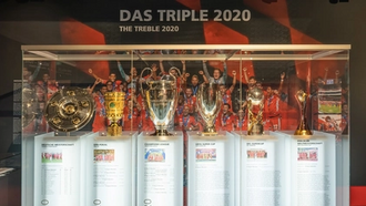 The six trophies won by Bayern Munich in 2020 exhibited in the Allianz Arena.