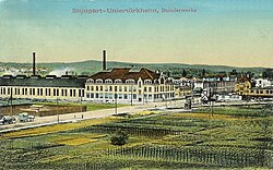 A colorized photo from 1911 of the Daimler-Motoren-Gesellschaft factory in Untertürkheim. Today, this building is the seat of Mercedes-Benz Group.