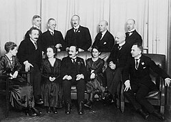 Physicists and chemists in Berlin in 1920. Front row, left to right: Hertha Sponer, Albert Einstein, Ingrid Franck, James Franck, Lise Meitner, Fritz Haber, and Otto Hahn. Back row, left to right: Walter Grotrian, Wilhelm Westphal, Otto von Baeyer [de], Peter Pringsheim [de] and Gustav Hertz