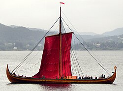 The modern longship Draken Harald Hårfagre raising its sail