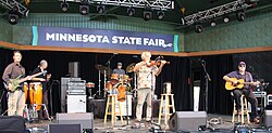 Cajun band BeauSoleil performing on a stage