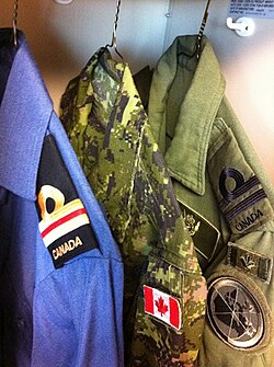 Operational dress uniforms for naval, field and air operations, shown here with naval rank insignia.