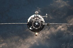 The Progress M-14M resupply vehicle approaching the ISS in 2012. Nearly 100 unpiloted Progress spacecraft have delivered supplies during the lifetime of the station.