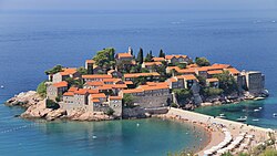 A view towards Sveti Stefan in Montenegro, tourism makes up a significant portion of the Montenegrin economy[105]