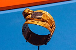 A gold and lapis lazuli duck-shaped bracelet of Ramesses II