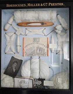 A display from a British cotton manufacturer of items used in a cotton mill during the Industrial Revolution