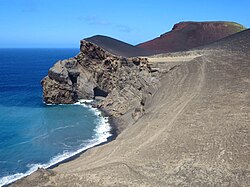 Layers of volcanic tephra from the 1957 eruption of Capelinhos on Faial in the Azores. Macaronesian islands are created by volcanic activity.