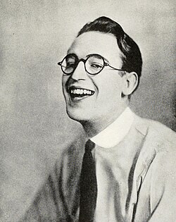 Comedian Harold Lloyd laughing