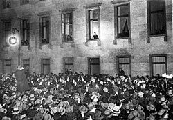 Hitler, at a window of the Reich Chancellery, receives an ovation on the evening of his inauguration as chancellor, 30 January 1933