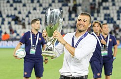 Luis Enrique with the 2015 UEFA Super Cup trophy