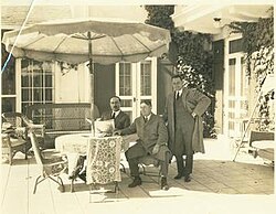 A photograph taken in 1925 of Wardman and Mesrobian seated together. By this time, Mesrobian was the primary in-house architect for Wardman.