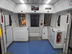 The front of the subway car is open for viewing thanks to driverless operation.