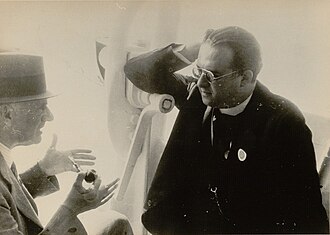 Lemaître and Arthur Eddington in discussion while sailing back from the 6th General Assembly of the International Astronomical Union, held in Stockholm in 1938