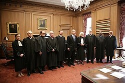 Supreme Court justices with President George W. Bush (center-right) in October 2005. Left to right are: Ruth Bader Ginsburg, David Souter, Antonin Scalia, John Paul Stevens, John Roberts, Sandra Day O'Connor, Anthony Kennedy, Clarence Thomas, and Stephen Breyer.