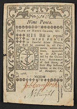 A nine-pence banknote issued by Rhode Island in 1786 with the inscription: ""STATE OF RHODE-ISLAND, &c. THIS Bill is equal to NINE PENCE in Lawful Silver Money, and shall be received in all Payments within this State, agreeable to an Act passed by the GENERAL ASSEMBLY of said State, at their May Sessions, holden at the City of Newport, A. D. 1786. 9d." ; "Committee" is written vertically, to the right of the signatures. ; Within seal: "DOMINE SPERAMUS IN TE".