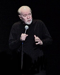 George Carlin has been accused of being a sellout for appearing in commercials for MCI, a company he had previously criticized.