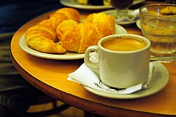 A typical Italian breakfast (Italian: colazione), consisting of cappuccino and cornetto
