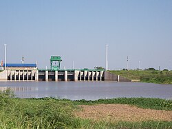 Dam on the Río Negro, near Resistencia, Chaco (Argentina); the torrential rains that follow the region's long dry season make flood-control works critical.