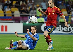 Iniesta evades Claudio Marchisio during the UEFA Euro 2012 final
