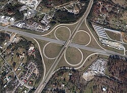 A full cloverleaf interchange between APD-40 and U.S. Route 64 near Cleveland, Tennessee 35°08′59.4″N 84°50′52.3″W﻿ / ﻿35.149833°N 84.847861°W