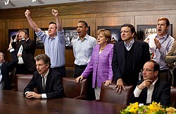 British Prime Minister David Cameron and German Chancellor Angela Merkel watching the penalty shoot-out with US President Barack Obama, French President François Hollande, European Commission President José Manuel Barroso and others during the G8 summit.