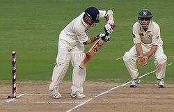 Indian cricketer Sachin Tendulkar, batting with his personalized Adidas cricket bat
