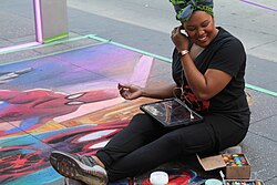 Amanda Harris of Southern California at the Minneapolis Street Art Festival in 2019[166]