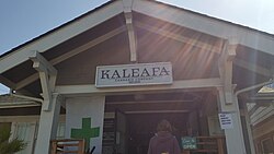 A cannabis dispensary in Portland, Oregon's Woodstock neighborhood with social distancing signage
