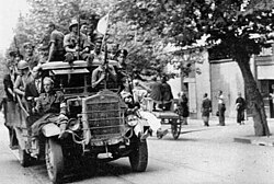 Insurgents celebrating the liberation of Naples, after the Four days of Naples (27–30 September 1943)