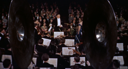 Bernard Herrmann conducting the orchestra in a scene from Hitchcock's The Man Who Knew Too Much (1956)