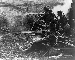 A detachment of French infantry with 2 Saint-Etienne Model 1907 machine guns (c. b1914)