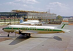 A Douglas DC-6 in front of the then-new terminal at Gatwick Airport in 1964