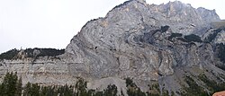 Folded Lower Jurassic limestone layers of the Doldenhorn nappe at Gasteretal, Switzerland