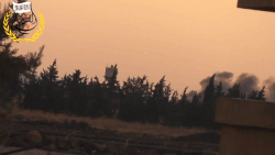 An ISIL suicide bomber detonates a car bomb during the Siege of Menagh Air Base.