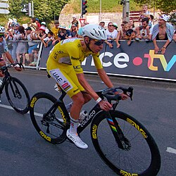 Tadej Pogačar, winner of the general classification wearing the yellow jersey