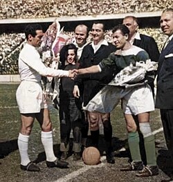 Real Madrid's captain Paco Gento shaking hands with Zamalek's captain Sharif El-Far before their friendly match on the occasion for celebrating 50 years on Zamalek's establishment in Cairo Stadium on 10 March 1961