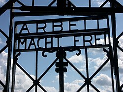 The gate at the Jourhaus building through which the prisoners' camp was entered contains the slogan, Arbeit macht frei, or 'Work Sets You Free.'