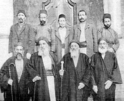 Rabbi Jacob Saul Dwek, Rabbi Reuven Ancona and officials of the great synagogue of Aleppo.