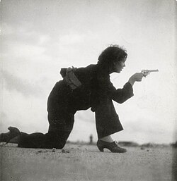 Woman training for a Republican militia by Gerda Taro, Somorrostro beach (1936)