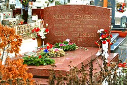 The current resting place of Nicolae and Elena Ceaușescu at Ghencea Cemetery. The tombstone erroneously states Elena's year of birth as 1919; she was born on 7 January 1916