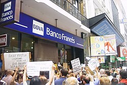 Depositors protest the freezing of their accounts, mostly in dollars. They were converted to pesos at less than half their new value.
