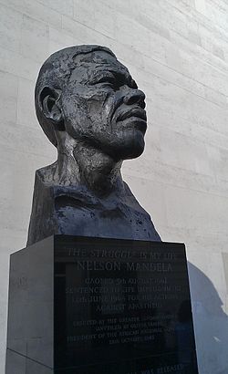 Bust of Nelson Mandela erected on London's South Bank. Mandela is widely considered a global hero for his role in opposing the apartheid system and inaugurating a multiracial democracy.[83][84][85]