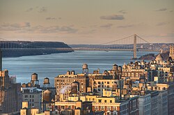 The George Washington Bridge, connecting Washington Heights in Upper Manhattan across the Hudson River to Fort Lee in Bergen County, New Jersey, is the world's busiest motor vehicle bridge.[256][257] Interstate 95 and U.S. Route 1/9 cross the river via the bridge, while U.S. Route 46, which lies entirely within New Jersey, ends halfway across the bridge at the state border with New York.