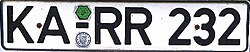 Number plate in pre-1994 format (DIN-style), no longer issued but still in use[b]