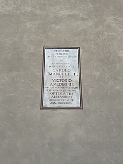 Commemorative plaque to the Municipal Theatre in the yard of Alessandria's town hall