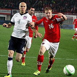 Bradley (left) and Austria's Martin Hinteregger in November 2013
