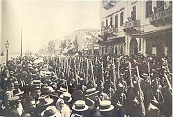 Greek troops marching on İzmir's coastal street, May 1919.