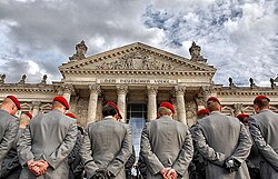New recruits standing in front of the Reichstag building, before taking the Bundeswehr oath. In the light of German militarism and due to its infamous history of the 20th century; Germany of today puts a strong emphasis on having armed forces compatible with a parliamentary system.